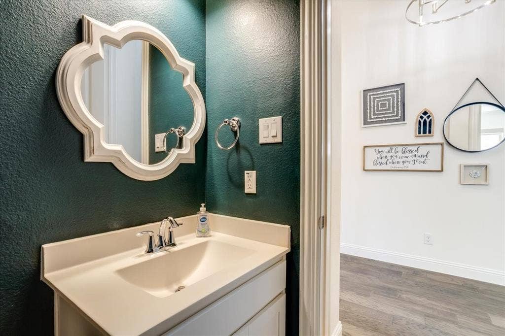 Powder bath off the entryway with designer paint.