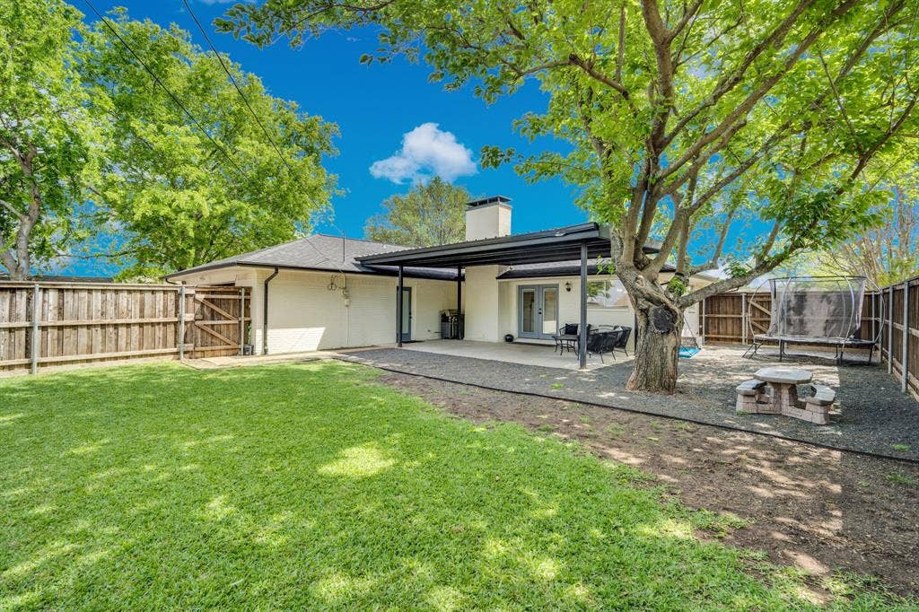 106 Hillcrest Drive, Midlothian, TX 76065 Massive backyard with mature trees, covered patio, rear entry garage.