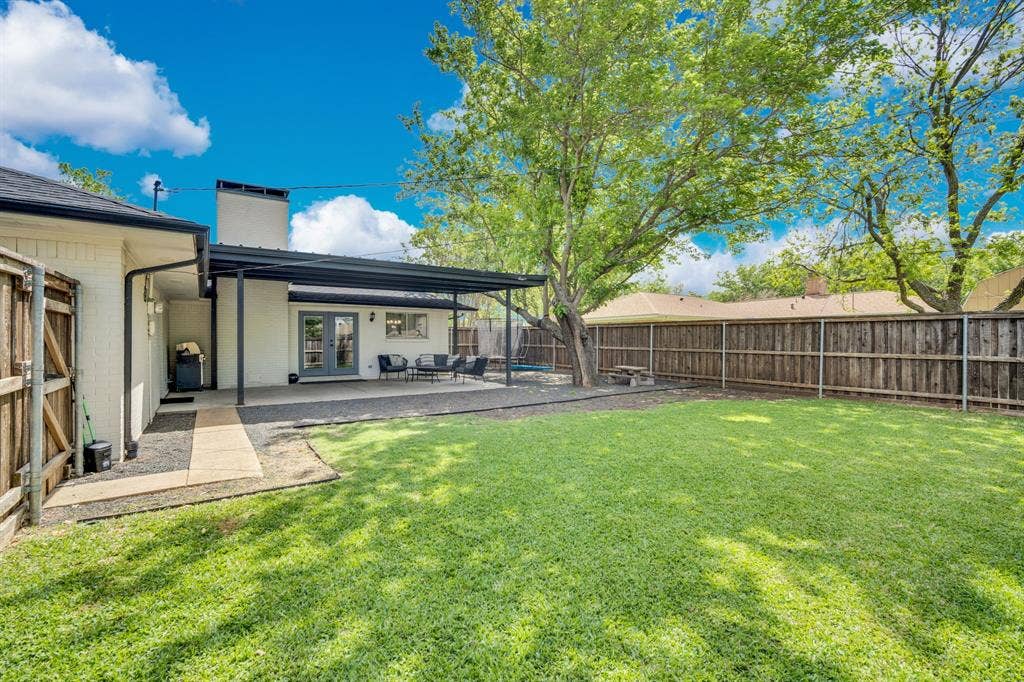 106 Hillcrest Drive, Midlothian, TX 76065 Fenced backyard featuring french doors and a patio area