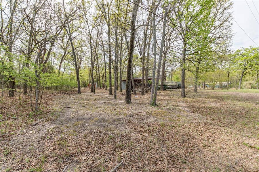 Property photo for 13995 E Travis Lane, Log Cabin, TX
