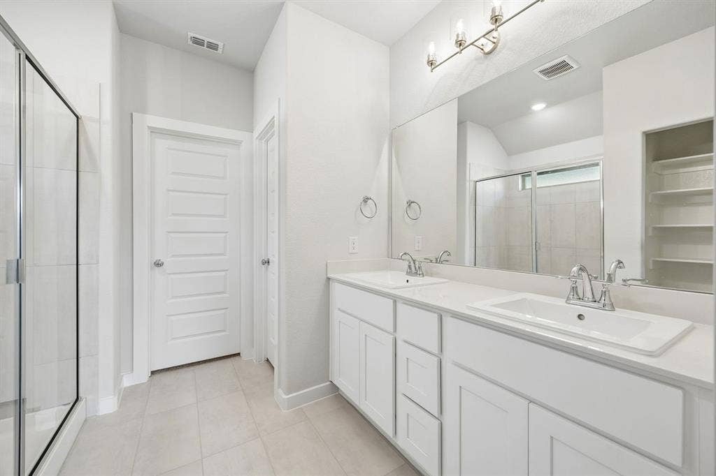 1448 Companero Street, Haslet, TX 76052 Primary Bathroom in the Oscar home plan by Trophy Signature Homes – REPRESENTATIVE PHOTO