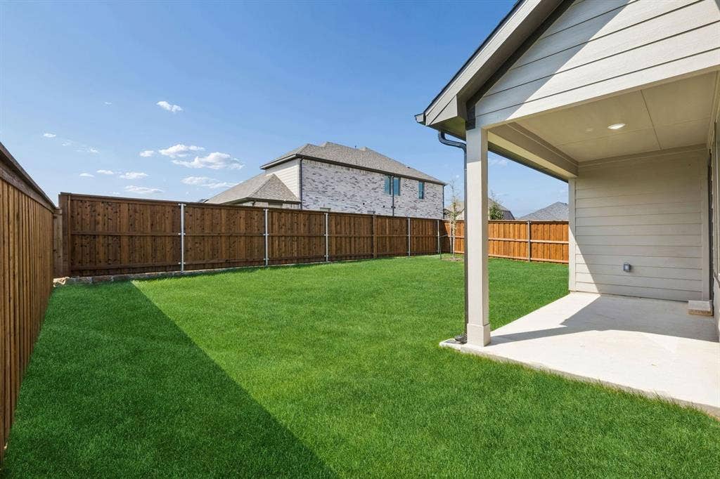 1448 Companero Street, Haslet, TX 76052 Patio in the Oscar home plan by Trophy Signature Homes – REPRESENTATIVE PHOTO