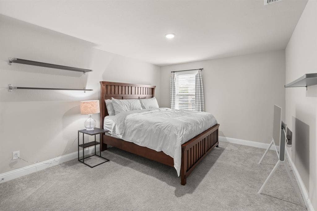 7018 Hickory Falls, Argyle, TX 76226 Spacious secondary bedroom upstairs.