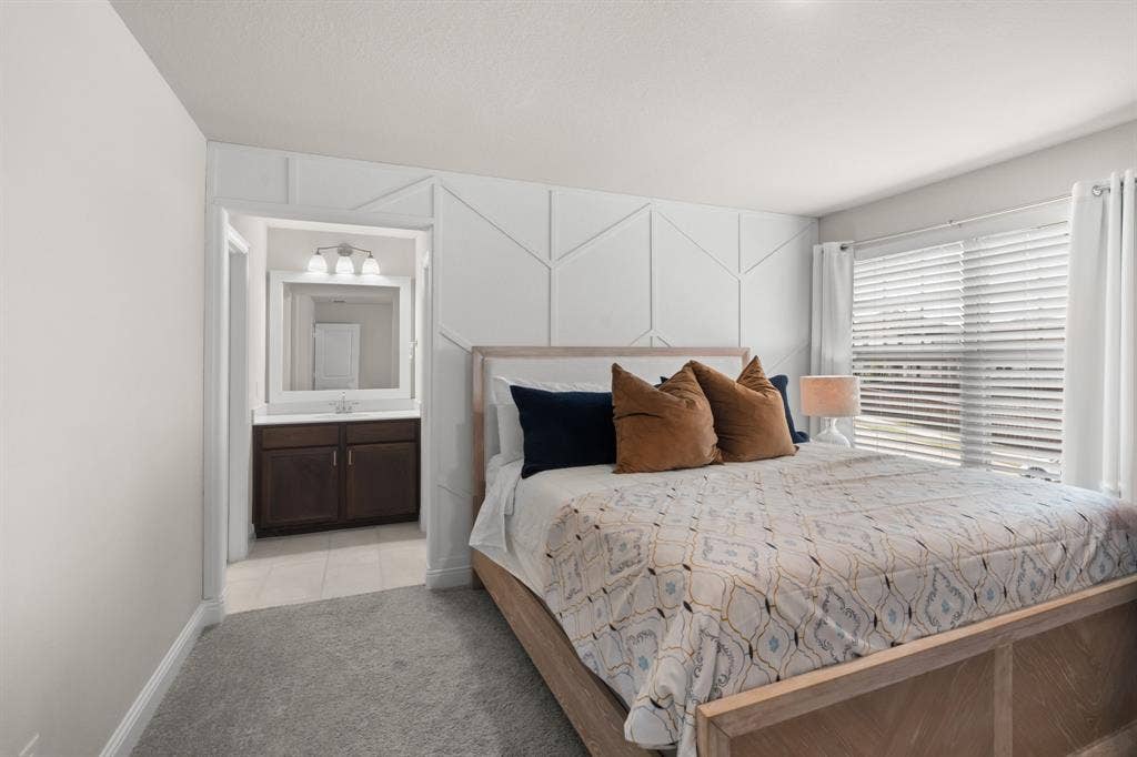 7018 Hickory Falls, Argyle, TX 76226 Upstairs secondary bedroom with ensuite bath.