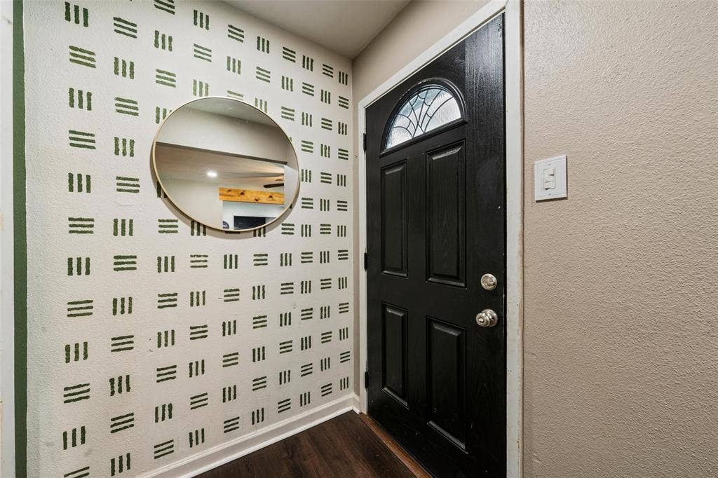 1207 Pembrook Drive, Waco, TX 76710 Entrance foyer with dark wood-type flooring and a textured wall