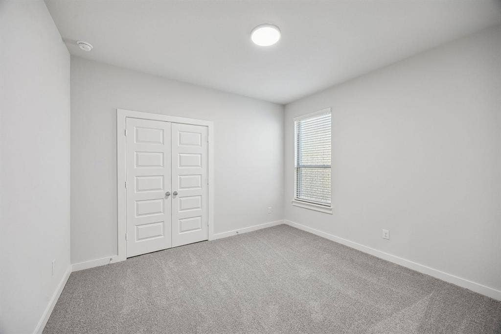 1461 Companero Street, Haslet, TX 76052 Bedroom in the Wimbledon home plan by Trophy Signature Homes – REPRESENTATIVE PHOTO