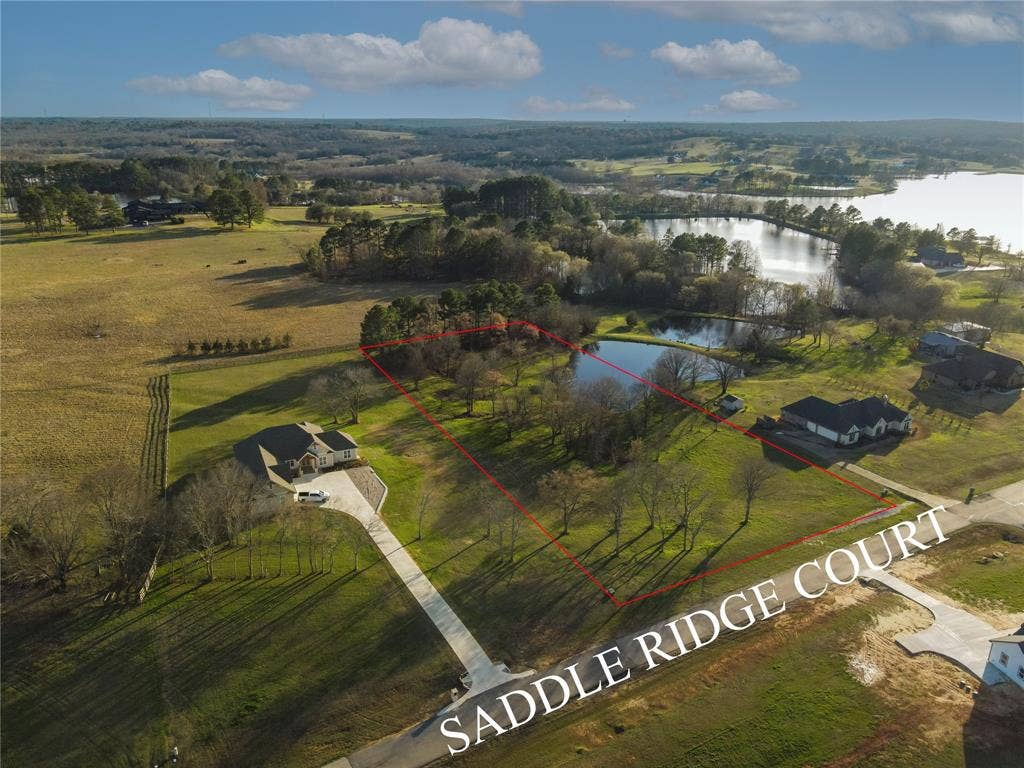5455 Saddle Ridge Court, Athens, TX 75752 Birds eye view of property with a water view and a rural view