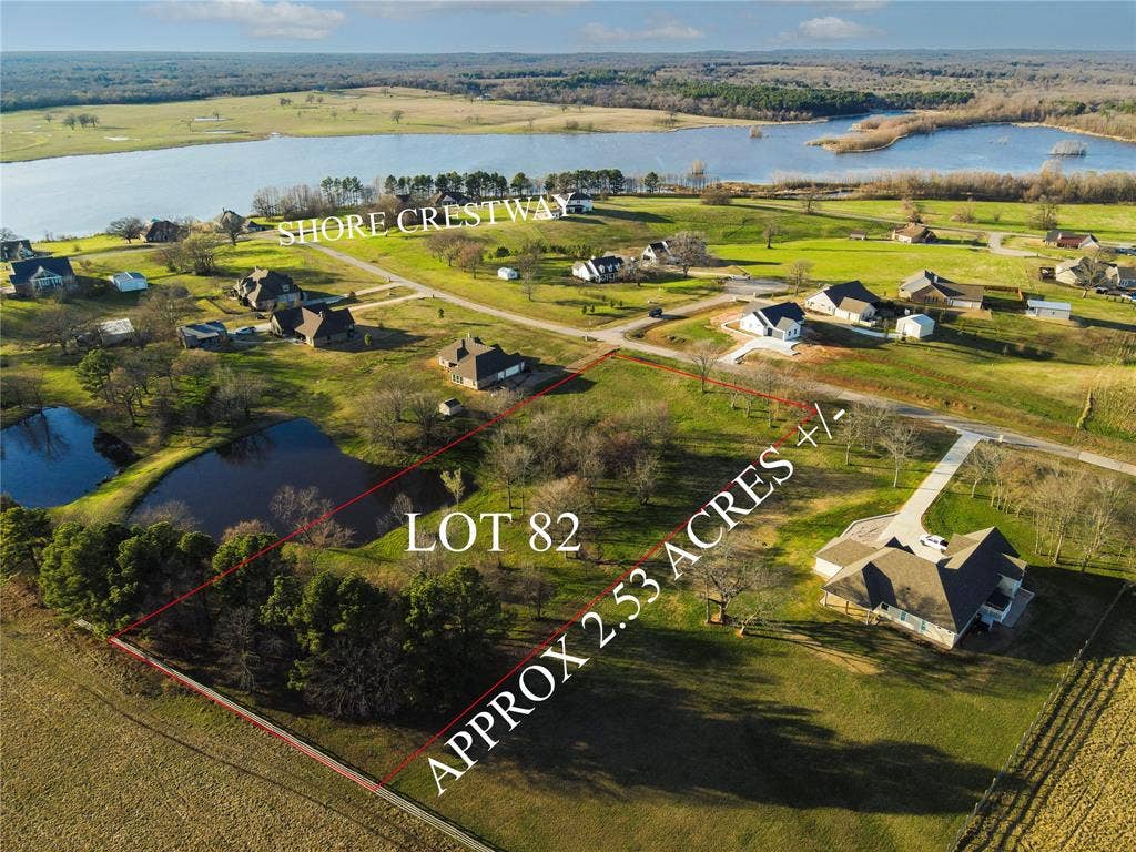 5455 Saddle Ridge Court, Athens, TX 75752 Drone / aerial view with a water view