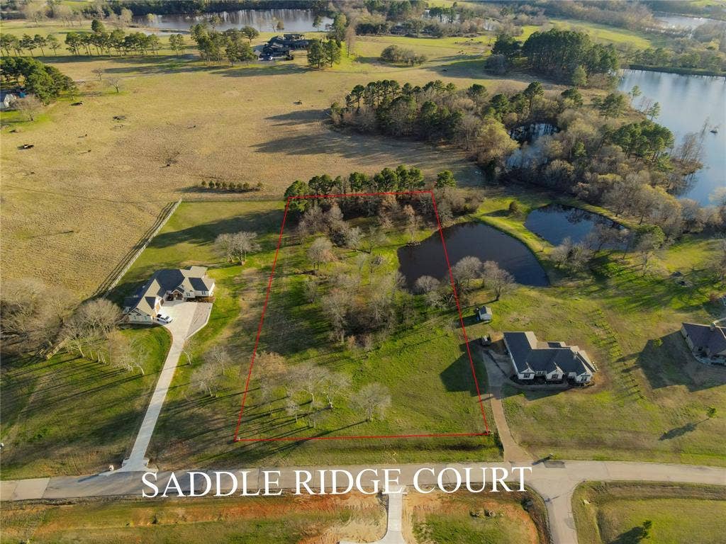 5455 Saddle Ridge Court, Athens, TX 75752 Drone / aerial view with a water view and a rural view