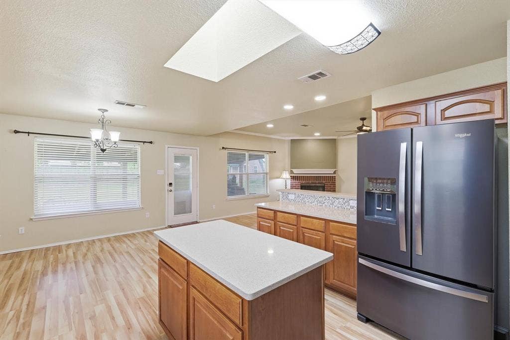 6421 Peak View Court, Midlothian, TX 76065 The kitchen has plenty of counter space, plus the island for additional storage and surface space