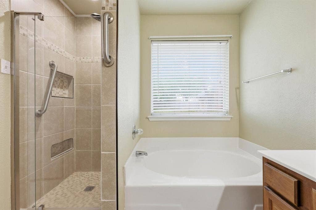 6421 Peak View Court, Midlothian, TX 76065 A perfect bathroom setup with separate shower and tub