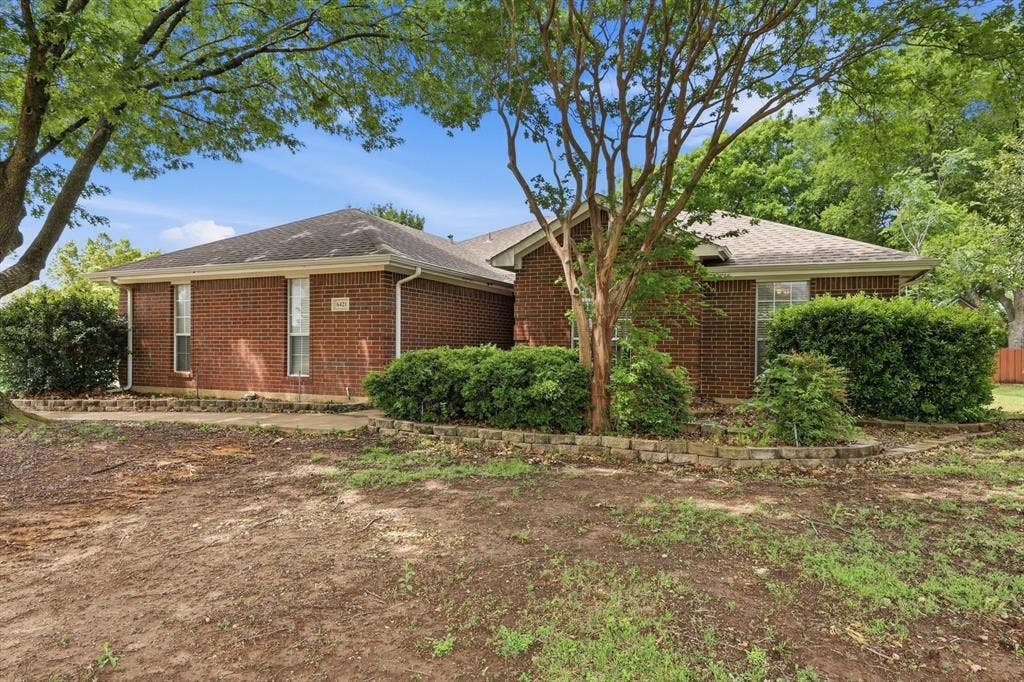 6421 Peak View Court, Midlothian, TX 76065 The beautiful all brick home has a roof that is less than 2 years old, plus gutters.
