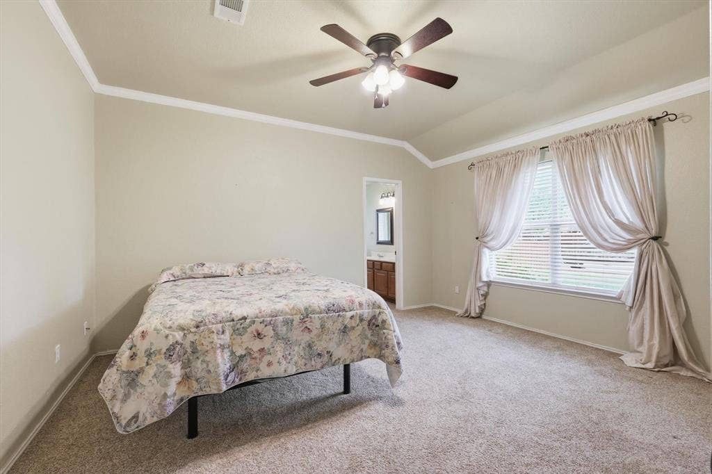 6421 Peak View Court, Midlothian, TX 76065 The primary bedroom features an ensuite bath room