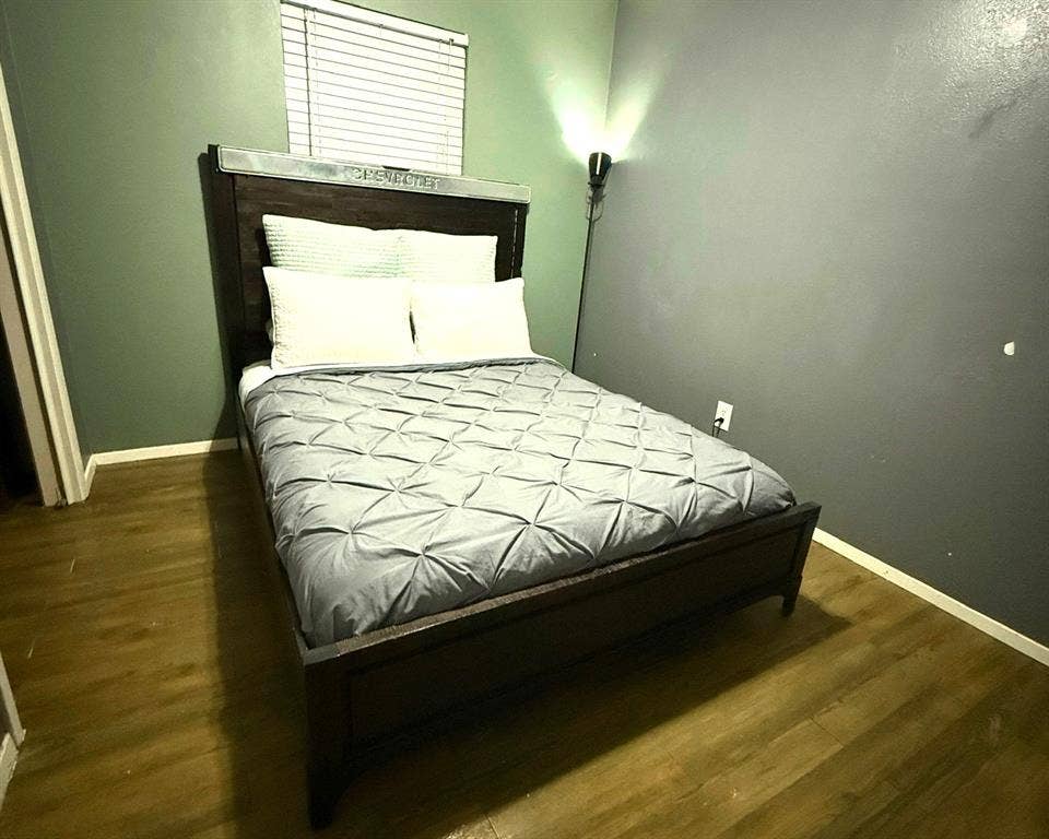 3020 Delaware Trail, Lake Worth, TX 76135 Bedroom with baseboards and wood finished floors