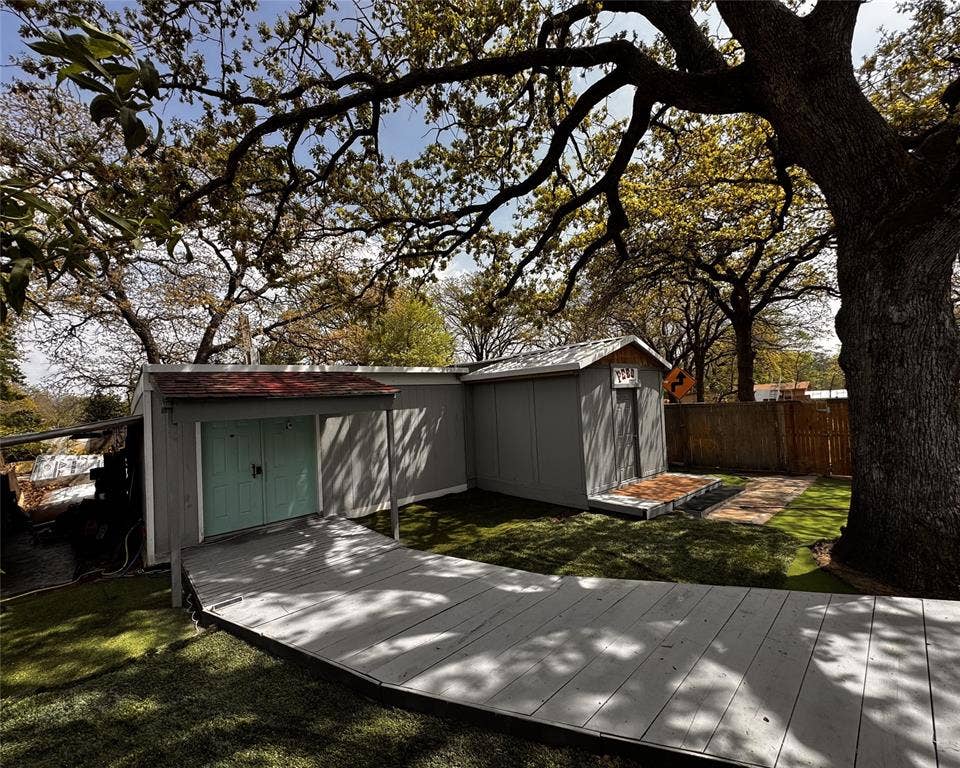 3020 Delaware Trail, Lake Worth, TX 76135 View of shed featuring a fenced backyard