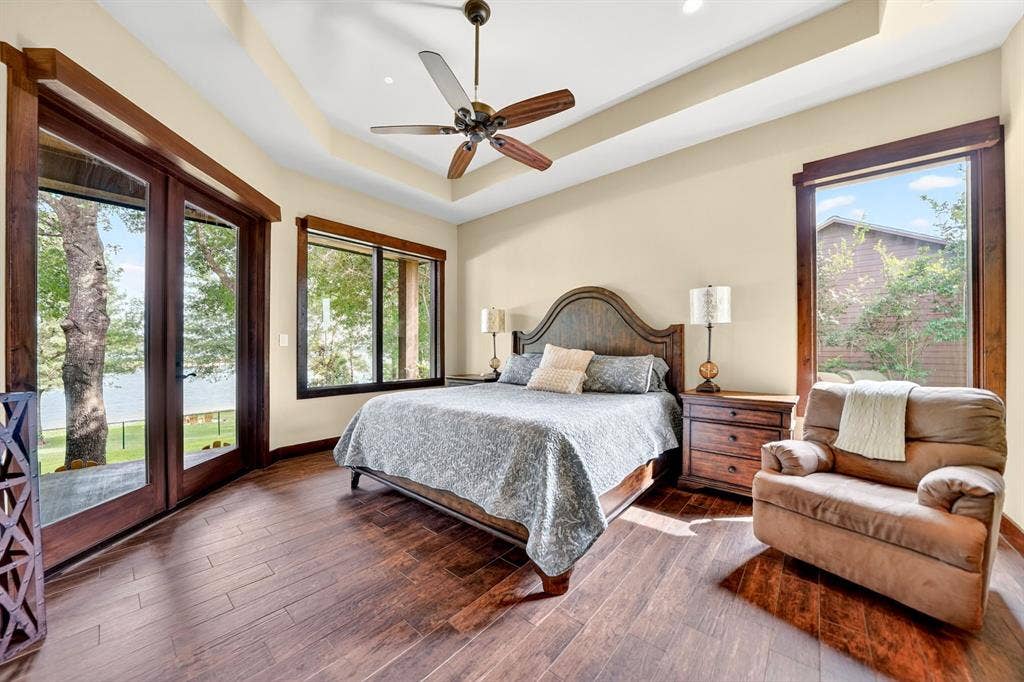 15491 Presidio Circle, Caney City, TX 75148 Tray ceiling with recessed lighting and a ceiling fan