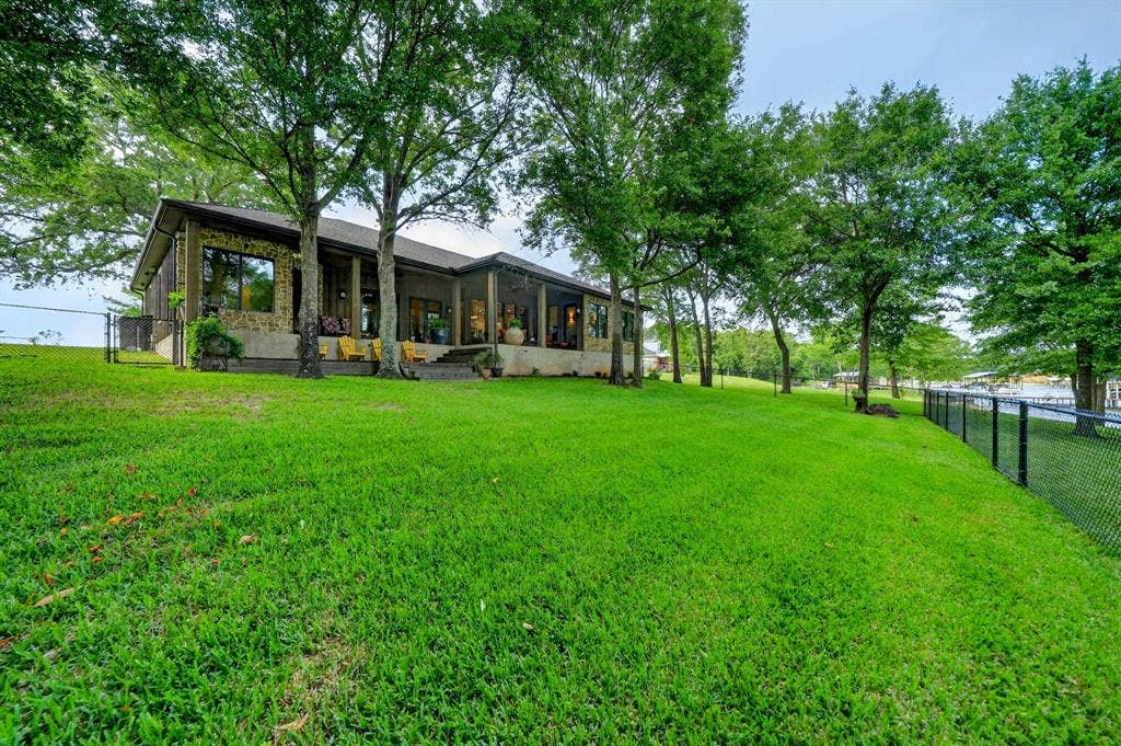 15491 Presidio Circle, Caney City, TX 75148 Expansive covered back patio featuring stone accents