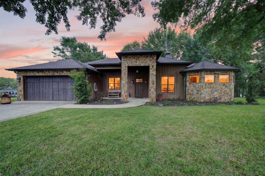 15491 Presidio Circle, Caney City, TX 75148 Stone and wood-sided exterior featuring a prominent stone entryway