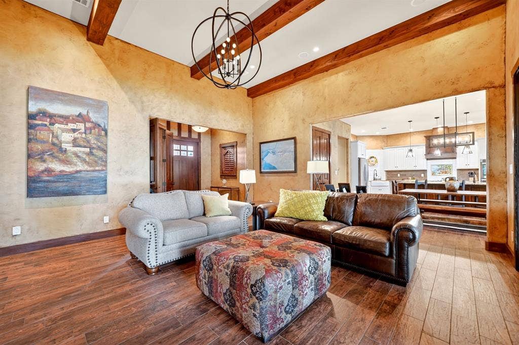 15491 Presidio Circle, Caney City, TX 75148 Vaulted ceiling with exposed wood beams, wood-finish flooring, and textured wall finish