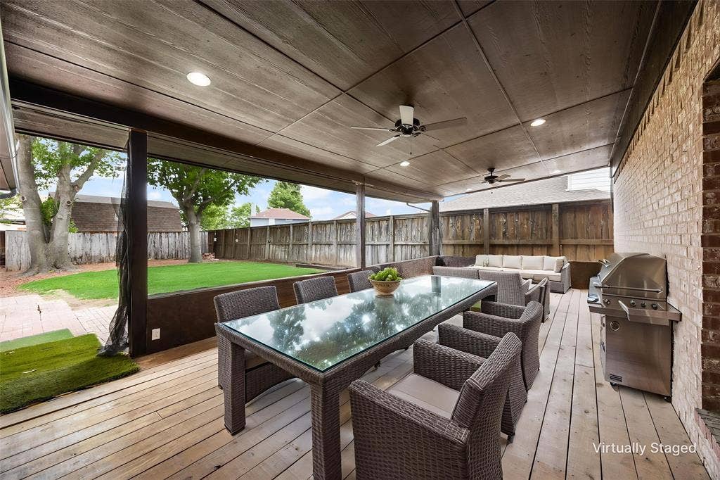 9209 Chimneywood Drive, Rowlett, TX 75089 Large deck with two ceiling fans and room for lots of outdoor furniture