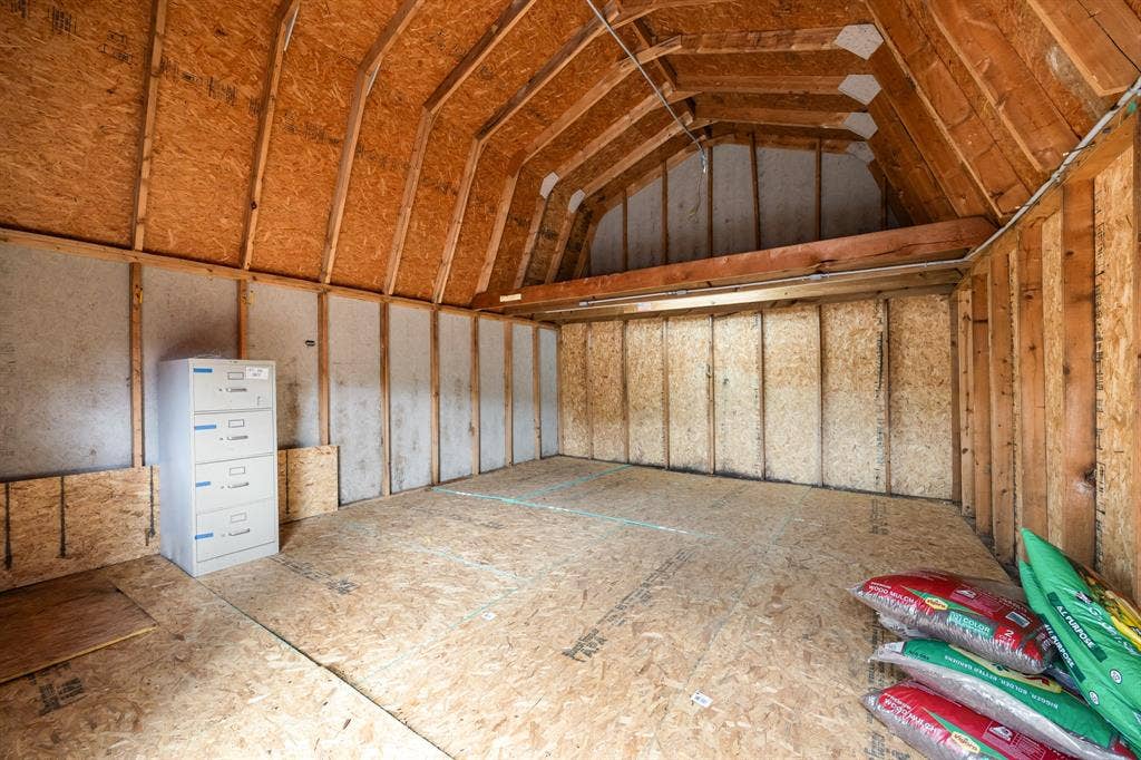 9209 Chimneywood Drive, Rowlett, TX 75089 16X20 workshop with electric. Plenty of room for upper storage.