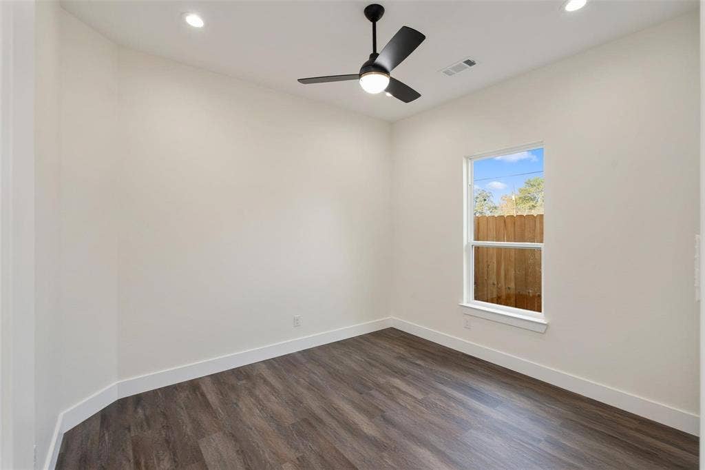 802.5 N Needmore Street, Athens, TX 75751 Empty room with recessed lighting, dark wood-style flooring, and ceiling fan