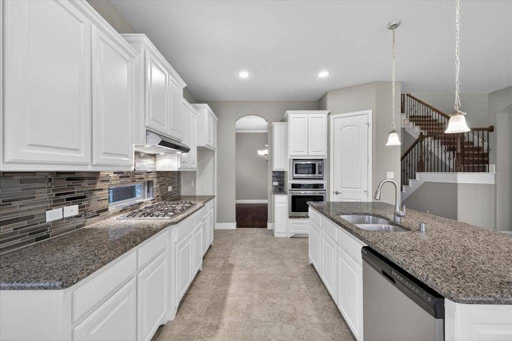 2417 Barclay Court, Plano, TX 75074 Kitchen is spacious plenty of cabinets