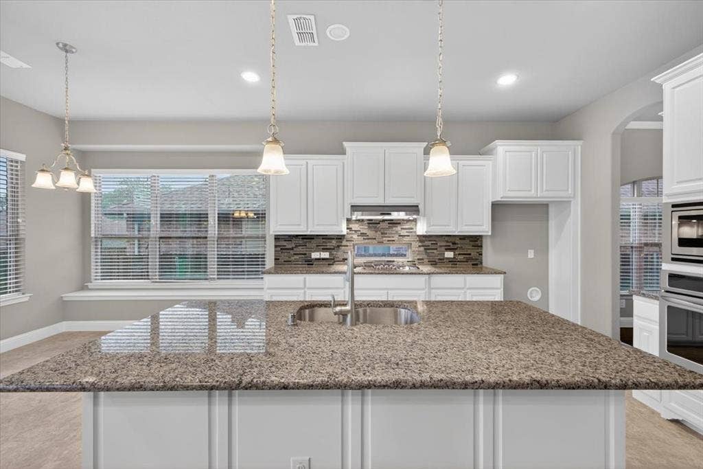 2417 Barclay Court, Plano, TX 75074 Island, add stools here for functional use of island.