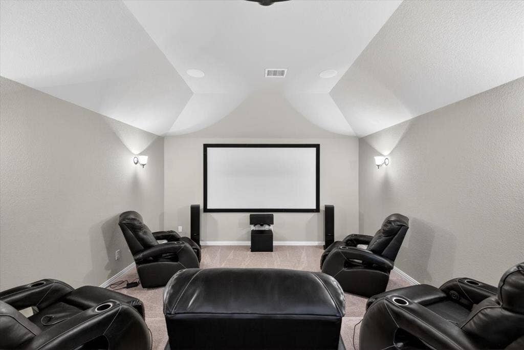 2417 Barclay Court, Plano, TX 75074 5 movie chairs, projector, mini fridge all stays for perfect at home theater.