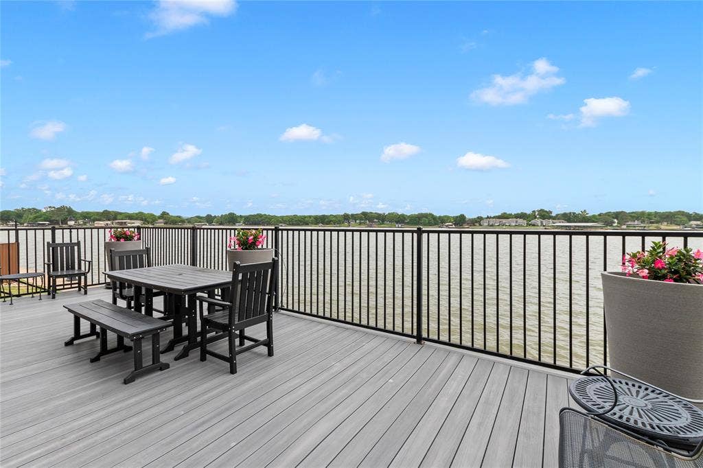 164 Marina Drive, Mabank, TX 75156 Spacious and durable composite deck faces east with protection from afternoon west sun. Experience southerly breezes while enjoying a cup of coffee in the morning or your favorite evening beverage.