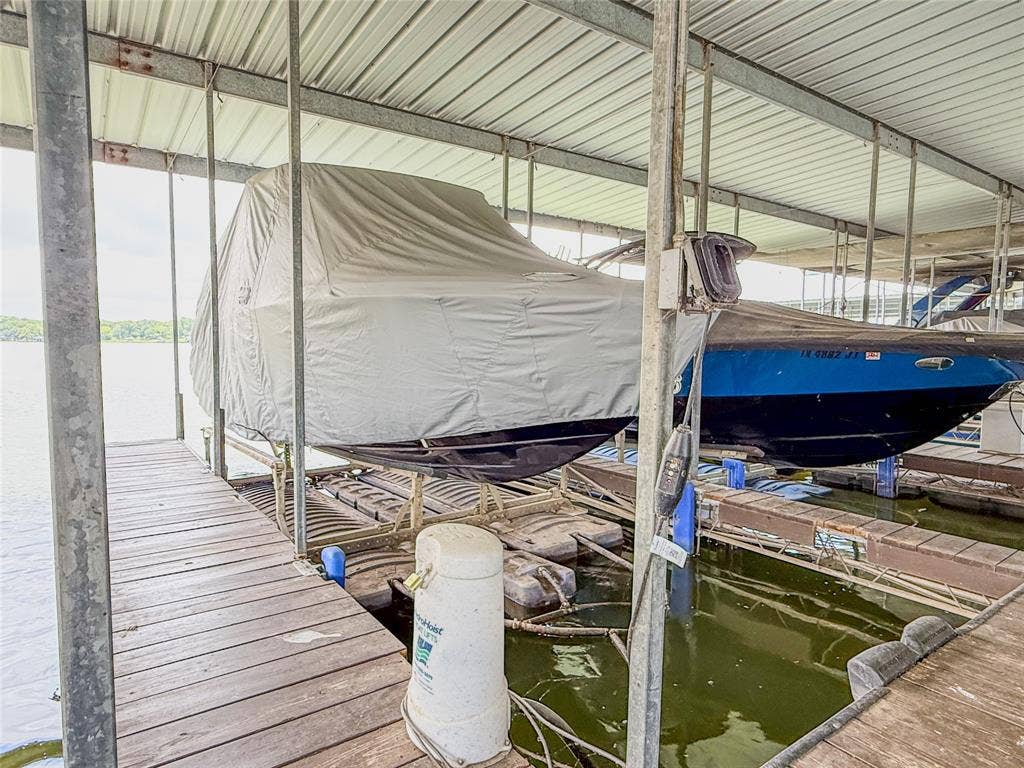 164 Marina Drive, Mabank, TX 75156 Includes boatslip #8 with HydroHoist lift. Watercraft not included.