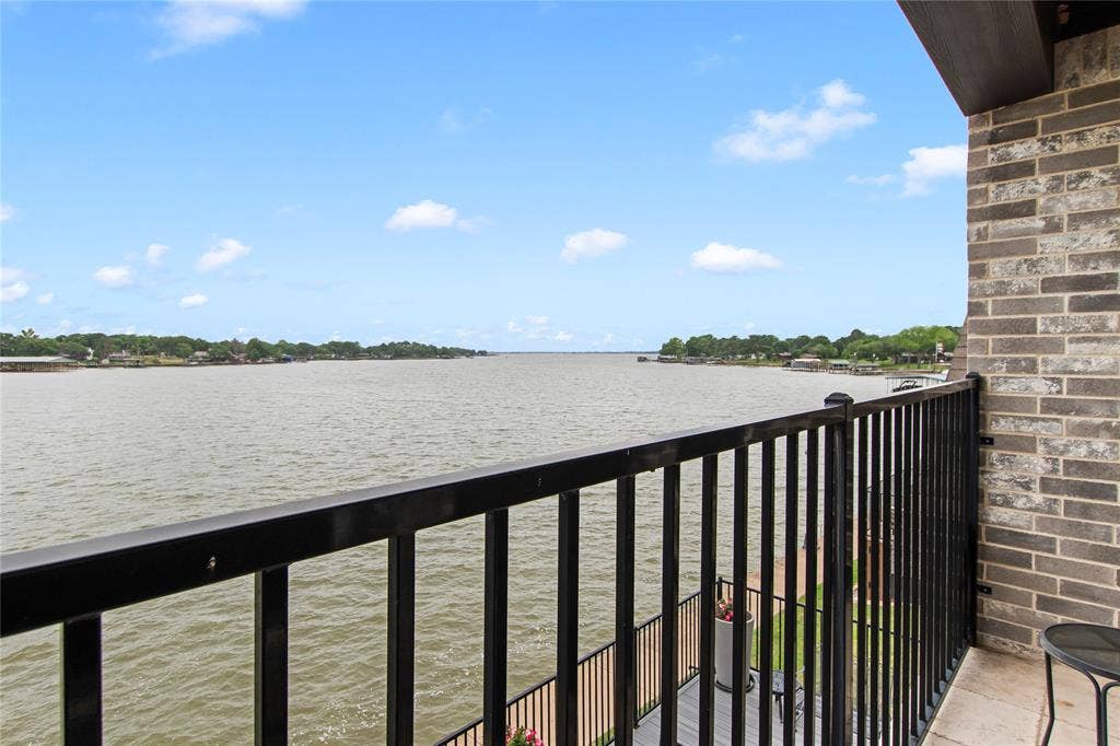 164 Marina Drive, Mabank, TX 75156 Balcony off the bonus room provides wonderful elevated water views and another place for outdoor enjoyment.
