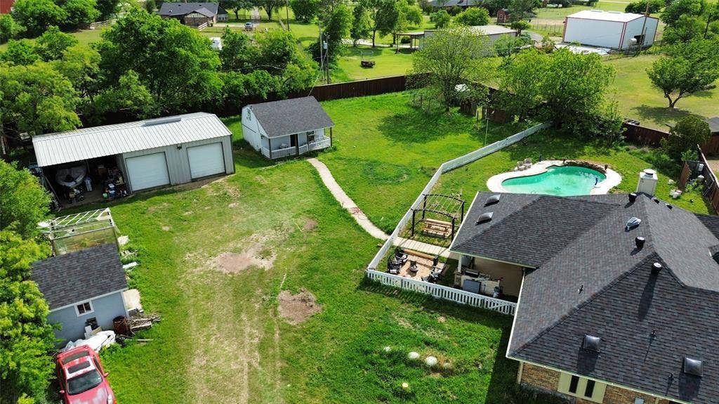 4200 Jennifer Lane, Crowley, TX 76036 Drone / aerial view of a pool area