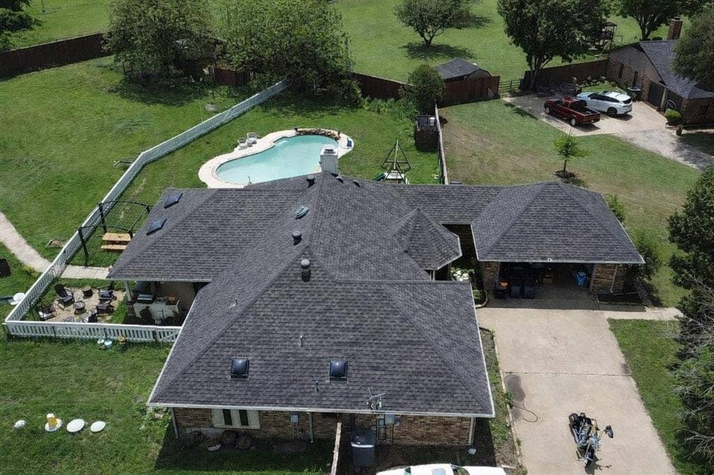 4200 Jennifer Lane, Crowley, TX 76036 Aerial view of property and surrounding area featuring a pool