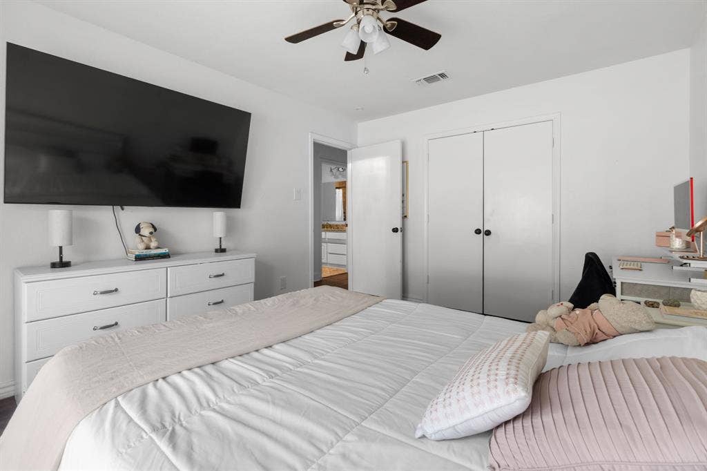 4200 Jennifer Lane, Crowley, TX 76036 Bedroom featuring a ceiling fan and a closet