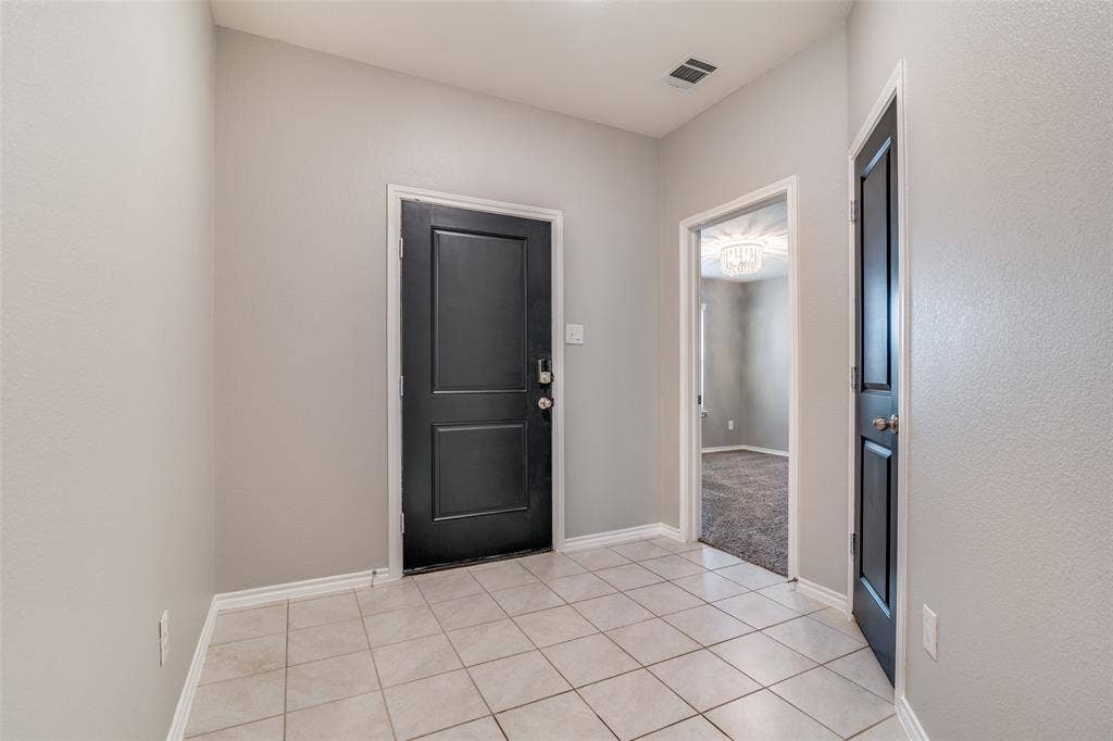 877 Darst Drive, Fate, TX 75189 View of kitchen and dining area