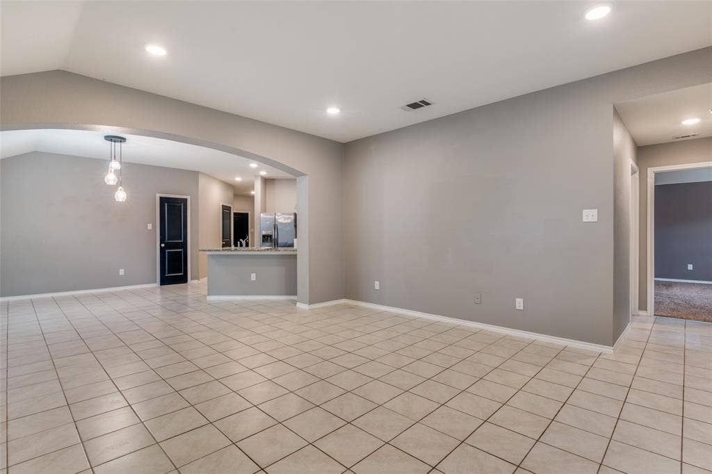 877 Darst Drive, Fate, TX 75189 Living room open to kitchen/dining