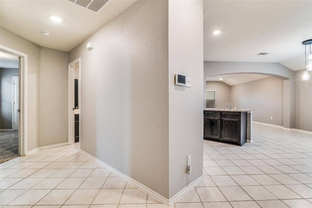 877 Darst Drive, Fate, TX 75189 View of kitchen and dining area