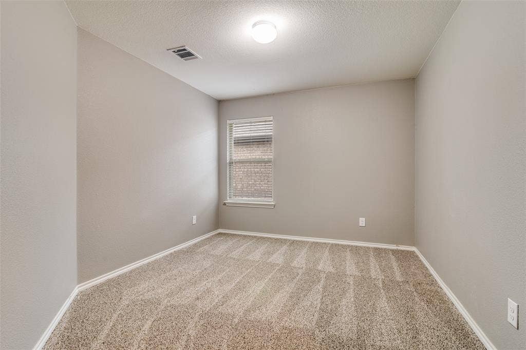 877 Darst Drive, Fate, TX 75189 Secondary bedroom