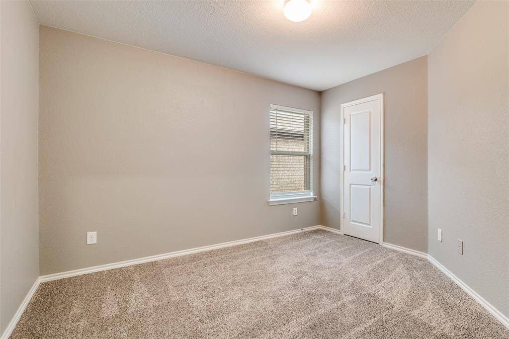 877 Darst Drive, Fate, TX 75189 Secondary bedroom