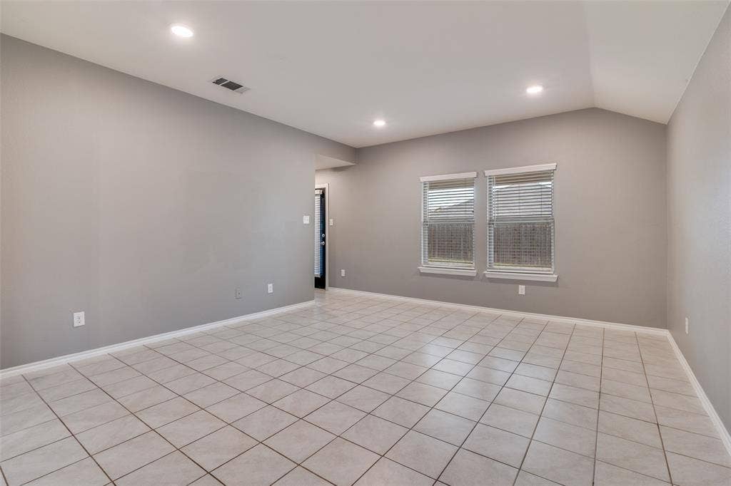 877 Darst Drive, Fate, TX 75189 Living room open to kitchen