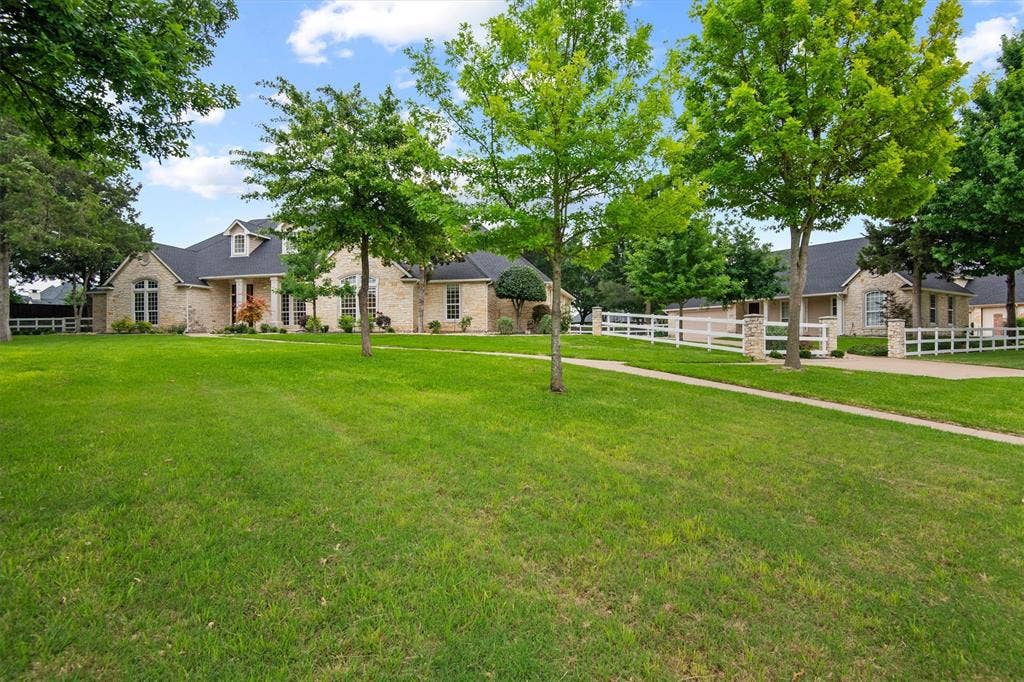 Welcome to 2202 Somerset!  Come fall in love with this stately property, featuring a main house, guest house, and a beautiful outdoor space!