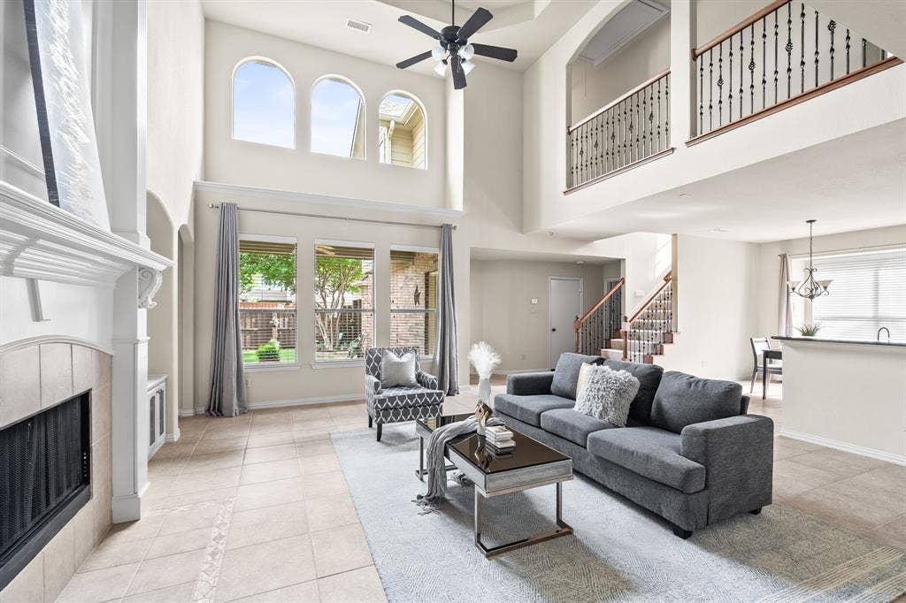 A wall of windows allowing natural light and privacy into mature landscaped yard.