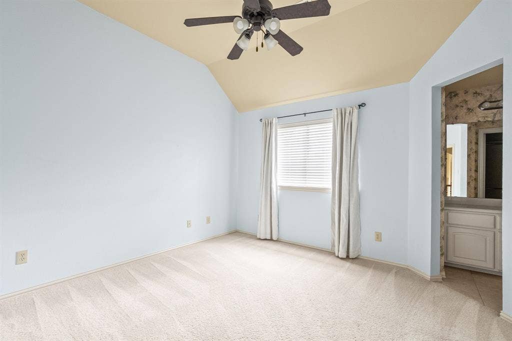 Upstairs bedroom with connecting bathroom.