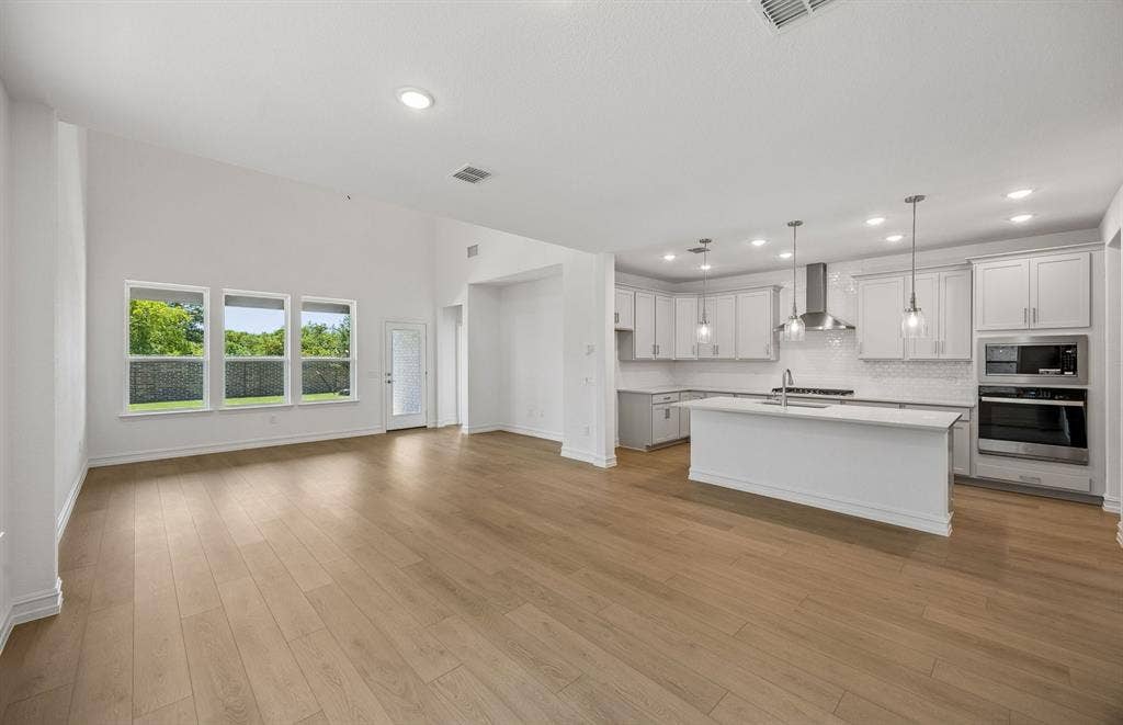 7337 Kurth Lane, McKinney, TX 75071 View of kitchen from gathering room