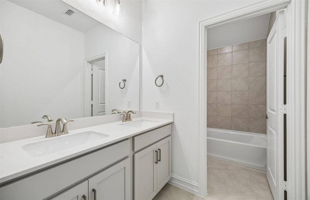 7337 Kurth Lane, McKinney, TX 75071 Secondary bath with double vanity