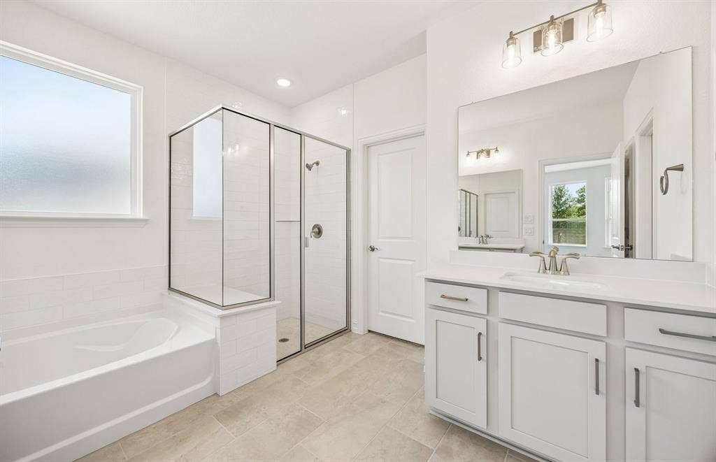 7337 Kurth Lane, McKinney, TX 75071 Separate tub and shower in primary bath