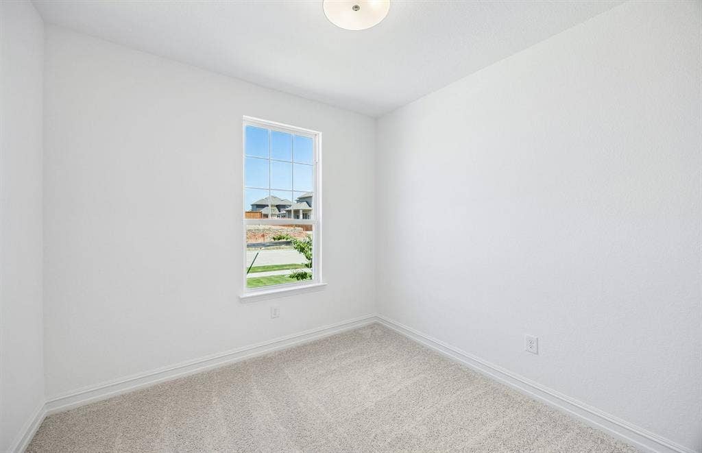 7337 Kurth Lane, McKinney, TX 75071 Secondary bedroom on first level