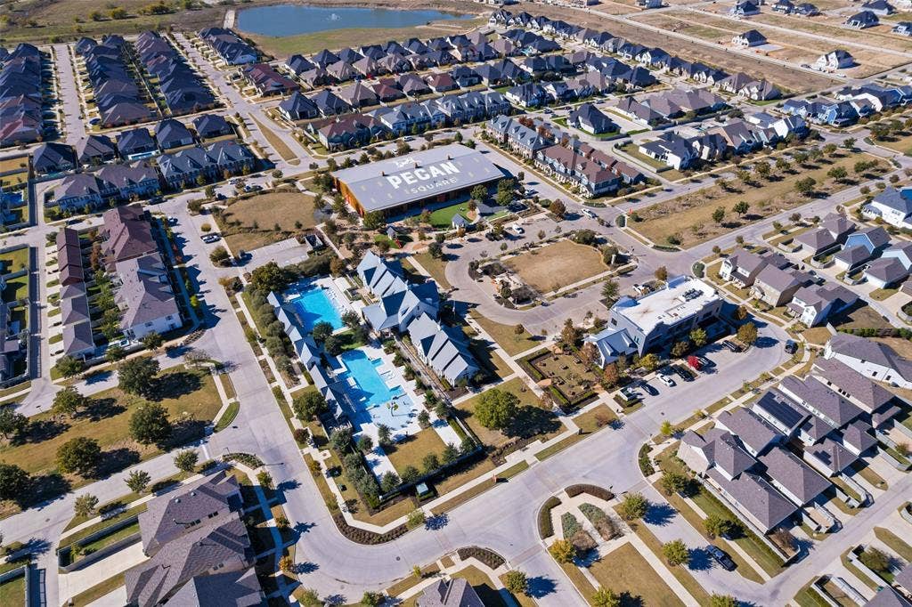 216 Shetland Lane, Northlake, TX 76247 Aerial view of the community, featuring numerous residential properties with dark-colored roofs