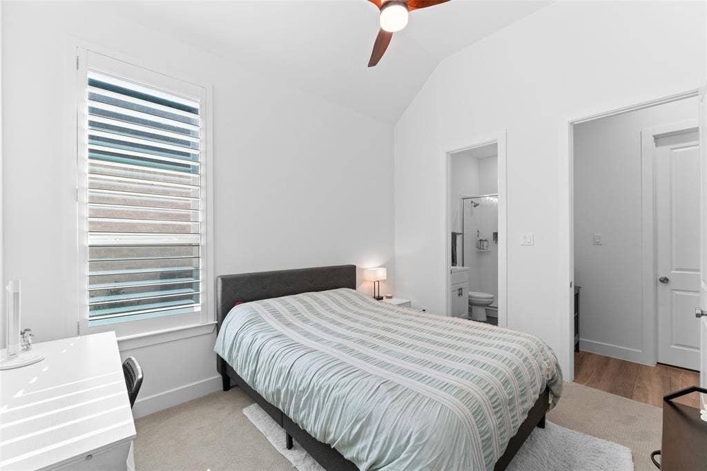 216 Shetland Lane, Northlake, TX 76247 Bedroom featuring a vaulted ceiling with a ceiling fan, a window with horizontal blinds, and carpeted flooring